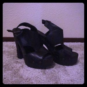 Calvin Klein “Terra” leather peep toe platforms